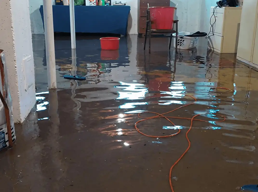 Basement with boiler, cabinets and washing machine completely flooded in Akron, OH