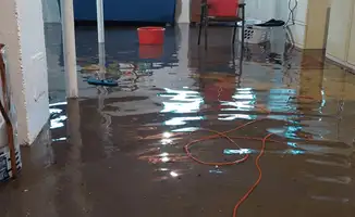 Basement with boiler, cabinets and washing machine completely flooded in Akron, OH