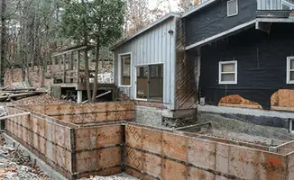 Prepared site with foundation forms for home remodeling and addition project in Akron, OH