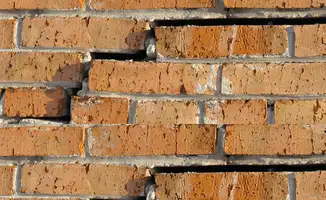 Brick wall with serious structural damage in Akron, OH