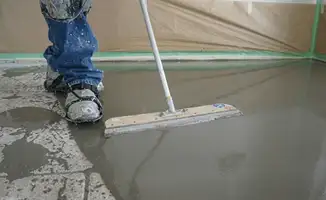 Uneven floor being professionally repaired in Akron, OH